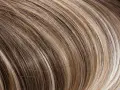 Braune Haare mit blonden Strähnchen: Welcher Look passt zu Ihnen?
